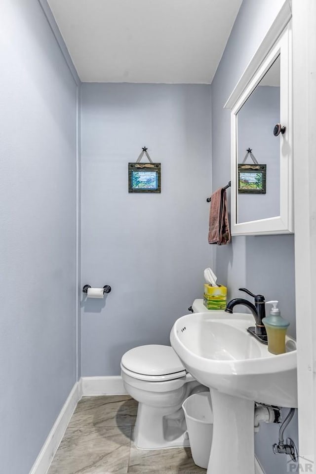 1215 Greenwood Ave, Canon City, CO 81212 - bathroom with baseboards and toilet