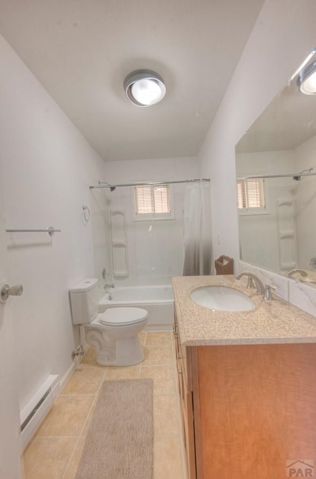 2000 Comanche Dr, Walsenburg, CO 81089 - bathroom featuring a baseboard radiator,  shower combination, vanity, toilet, and healthy amount of natural light