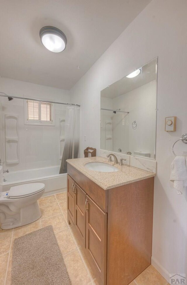 2000 Comanche Dr, Walsenburg, CO 81089 - full bath with shower / bath combo, toilet, vanity, and tile patterned floors