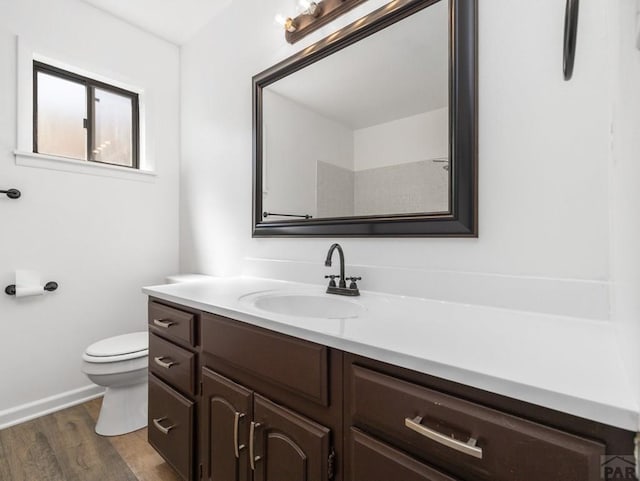 213 Starlite Dr, Pueblo, CO 81005 - bathroom with vanity and wood finished floors