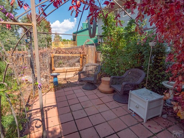 view of patio / terrace with fence