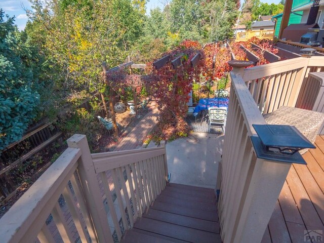 wooden deck featuring a garden