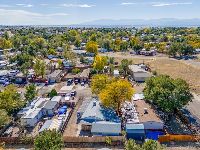 birds eye view of property with a residential view and a mountain view