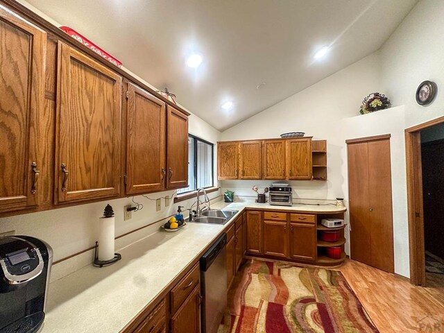 kitchen featuring open shelves, light countertops, stainless steel dishwasher, brown cabinetry, and a sink