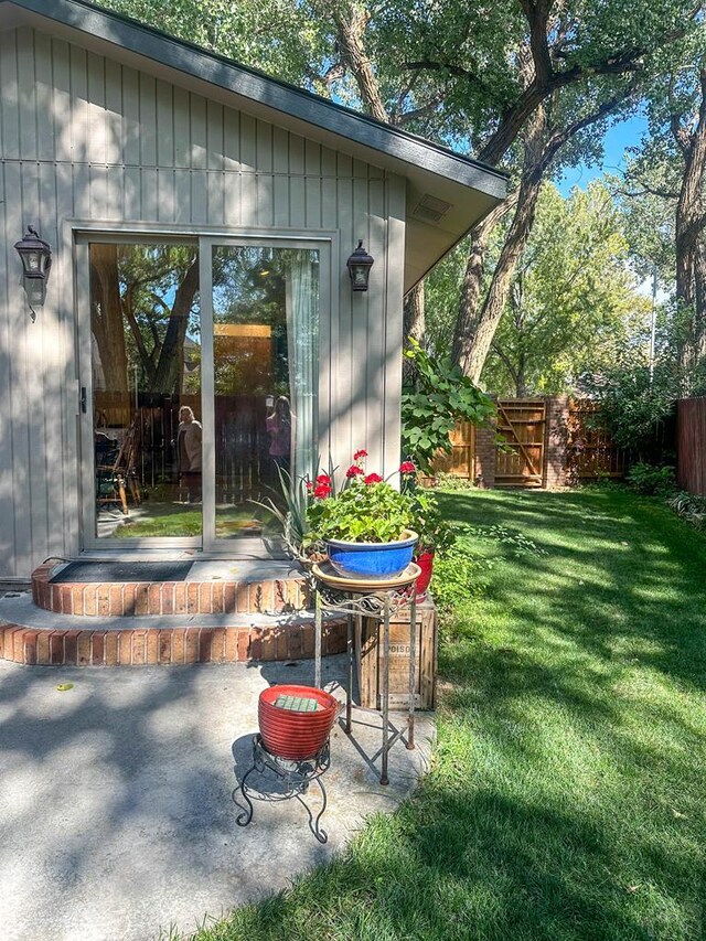 view of outbuilding with an outdoor structure and fence private yard