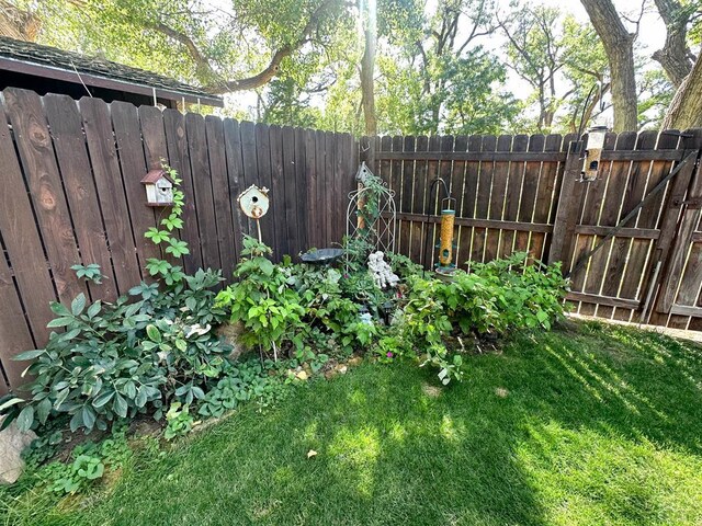 view of yard with fence