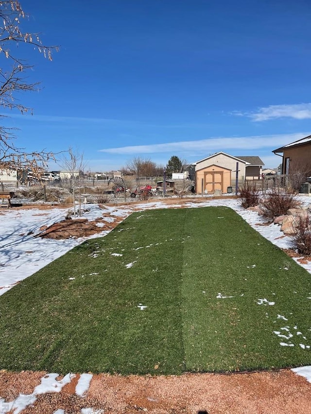 view of yard covered in snow