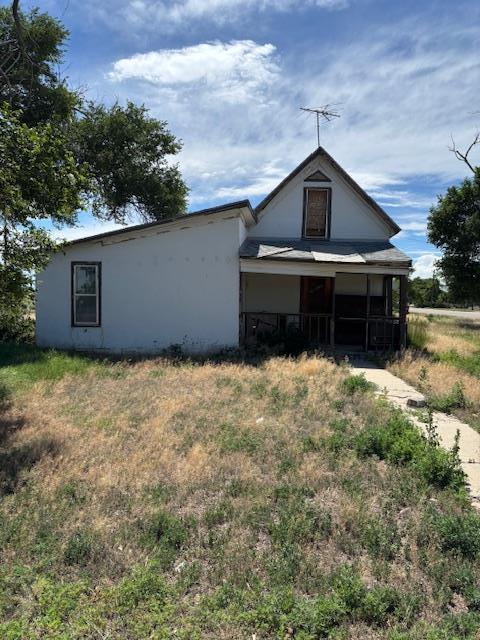 214 Short, Ordway, CO 81063 - back of house with a porch and stucco siding