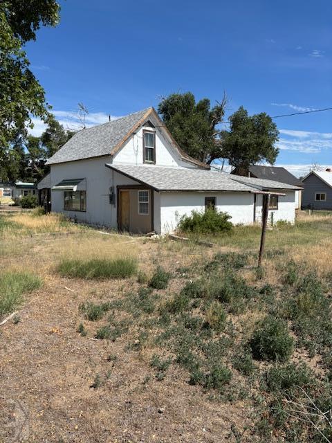 214 Short, Ordway, CO 81063 - view of front of property with roof with shingles