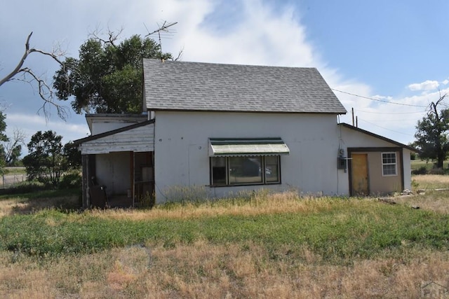 214 Short, Ordway, CO 81063 - view of property exterior featuring a shingled roof