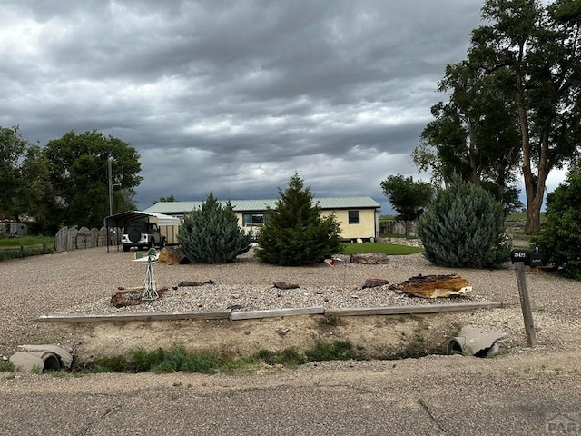 25433 County Rd 25, La Junta, CO 81050 - view of front of home with metal roof