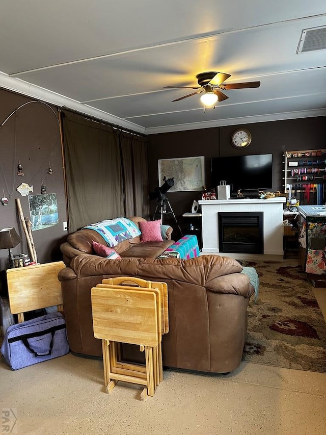 25433 County Rd 25, La Junta, CO 81050 - living room featuring a ceiling fan, a fireplace, and ornamental molding