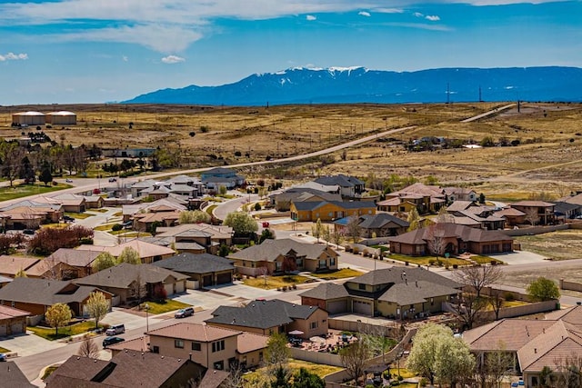 drone / aerial view featuring a mountain view and a residential view