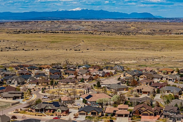 bird's eye view with a mountain view