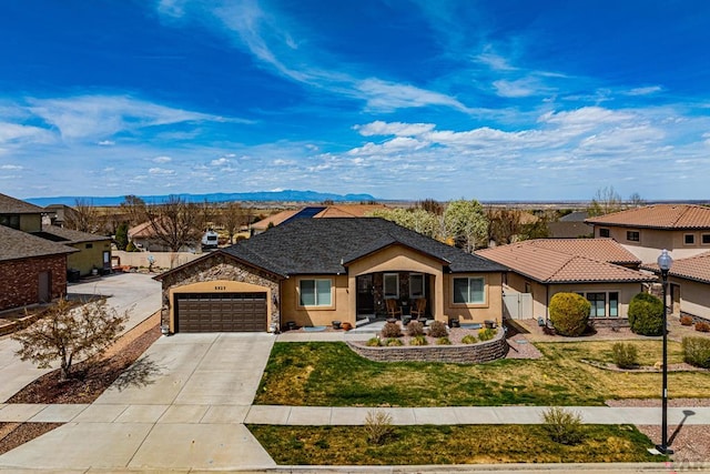 ranch-style house with a residential view, stucco siding, driveway, an attached garage, and a front lawn