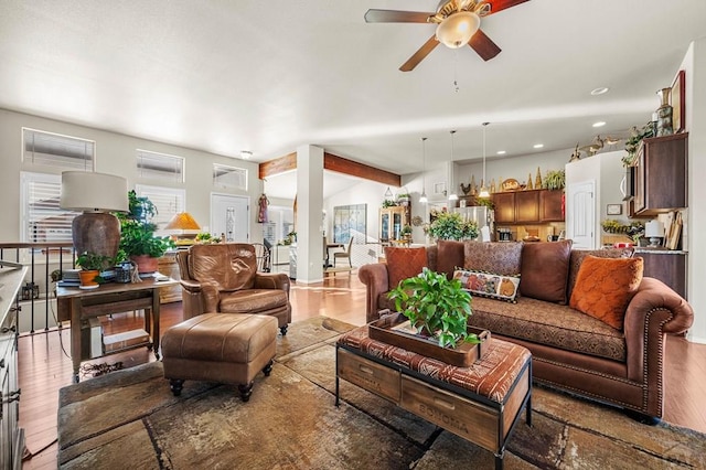 living area with wood finished floors, a ceiling fan, and recessed lighting