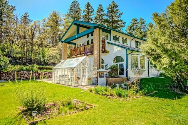 5207 N Creek Rd, Beulah, CO 81023 - view of greenhouse featuring a yard