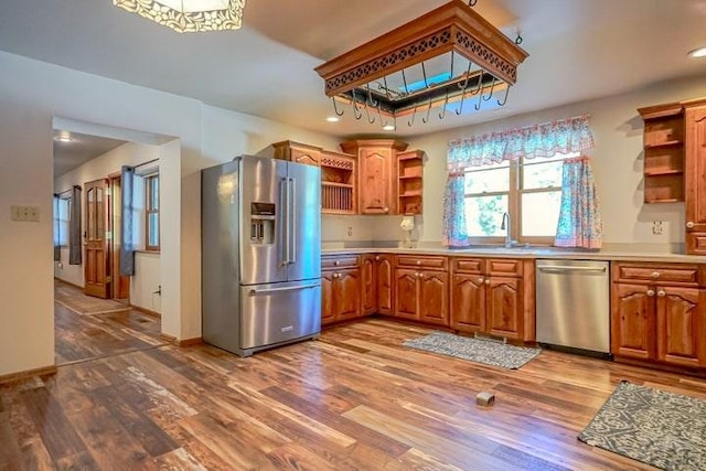 5207 N Creek Rd, Beulah, CO 81023 - kitchen featuring stainless steel appliances, open shelves, a sink, dark wood-type flooring, and recessed lighting