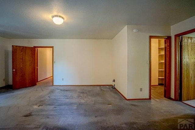 5207 N Creek Rd, Beulah, CO 81023 - unfurnished bedroom with baseboards and carpet flooring