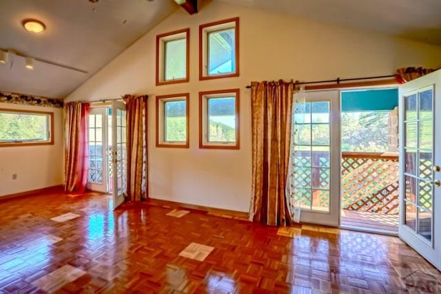 5207 N Creek Rd, Beulah, CO 81023 - empty room featuring baseboards and high vaulted ceiling