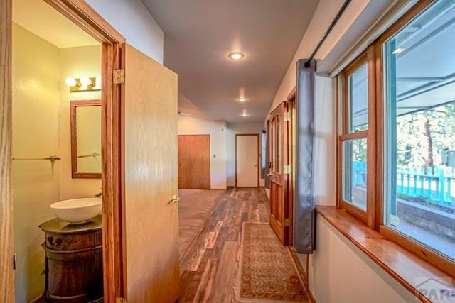 5207 N Creek Rd, Beulah, CO 81023 - corridor featuring a sink, wood finished floors, and recessed lighting