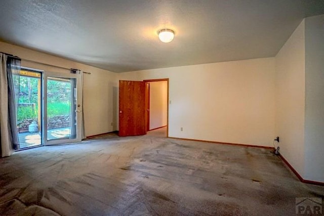 5207 N Creek Rd, Beulah, CO 81023 - empty room featuring light carpet and baseboards