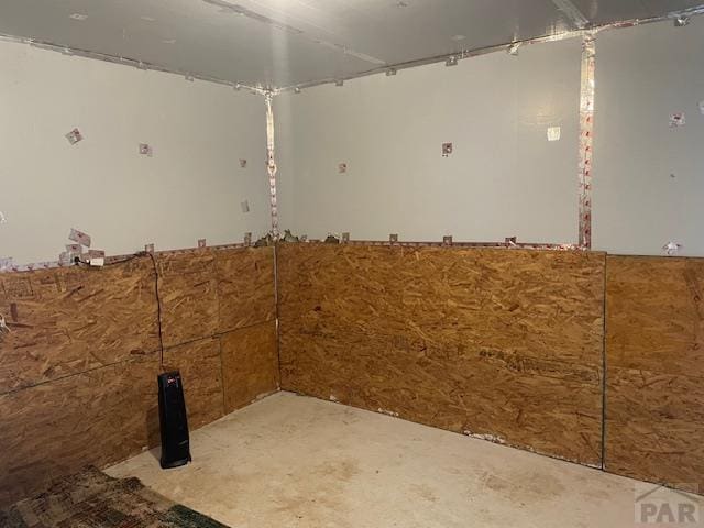 interior space featuring concrete flooring