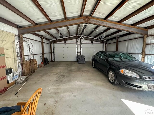 garage featuring metal wall