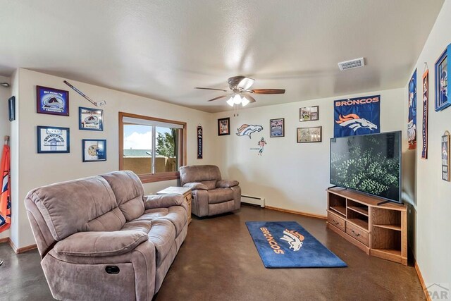 living room with a baseboard heating unit, ceiling fan, visible vents, and baseboards