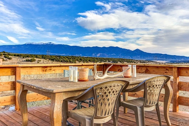 wooden terrace with a mountain view and outdoor dry bar
