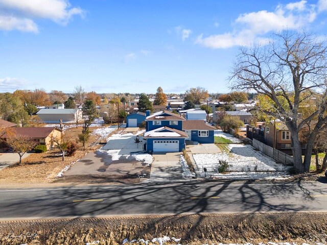 drone / aerial view with a residential view