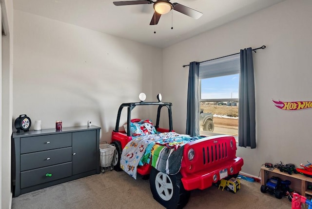 bedroom with light carpet and ceiling fan