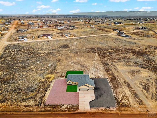 aerial view with a rural view and a mountain view