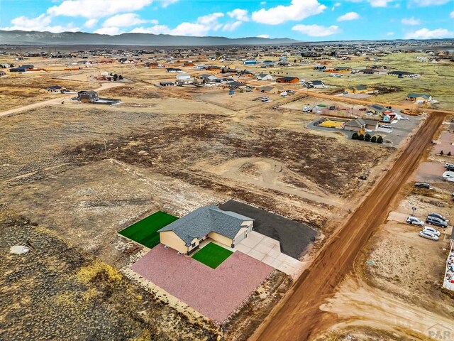 aerial view featuring a mountain view