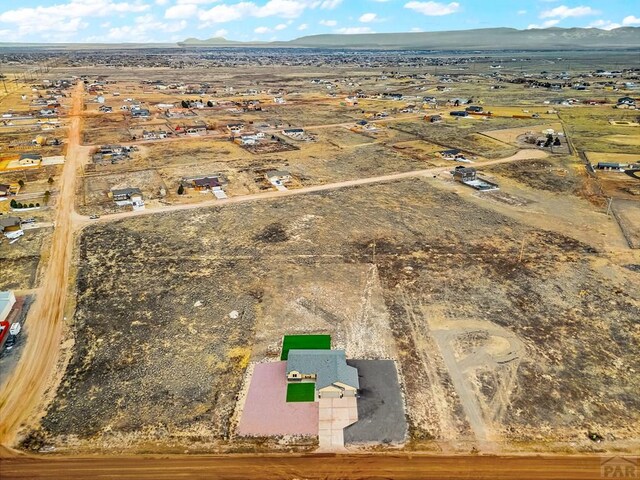 aerial view featuring a mountain view