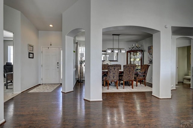 10919 Cascading Spring Cir, Peyton, CO 80831 - foyer entrance featuring wood finished floors, baseboards, recessed lighting, and a towering ceiling
