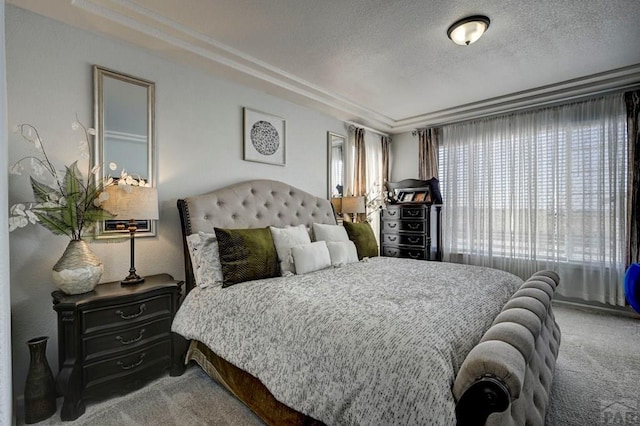 10919 Cascading Spring Cir, Peyton, CO 80831 - carpeted bedroom featuring ornamental molding and a textured ceiling