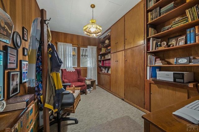 office with carpet and wood walls