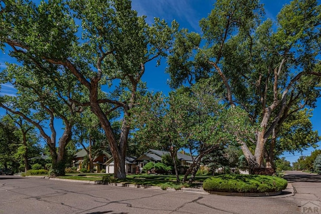 exterior space featuring a residential view and driveway