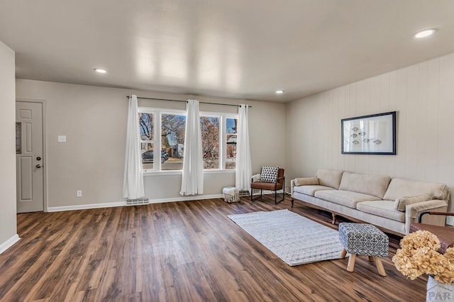 unfurnished living room featuring visible vents, recessed lighting, wood finished floors, and baseboards