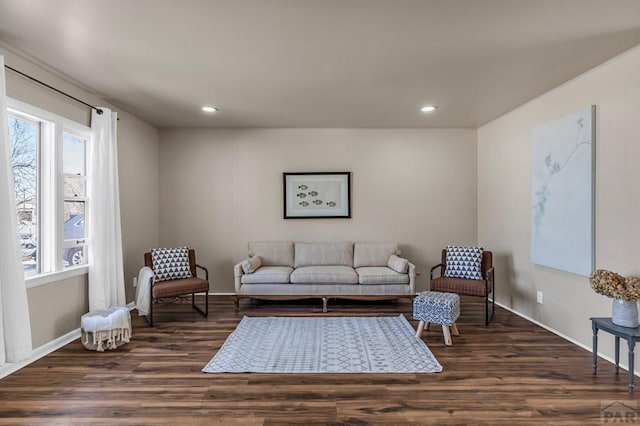 living area featuring plenty of natural light, recessed lighting, and wood finished floors