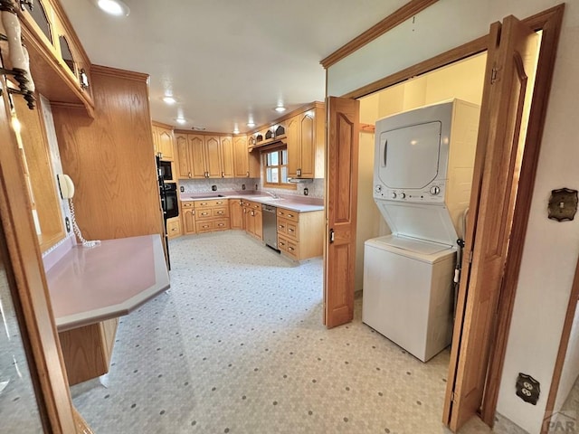 1645 Cherrywood Ln, Pueblo, CO 81005 - washroom featuring stacked washer / dryer, light flooring, recessed lighting, and crown molding