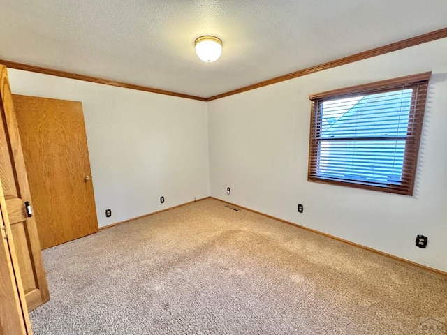 1645 Cherrywood Ln, Pueblo, CO 81005 - unfurnished room featuring light colored carpet and ornamental molding