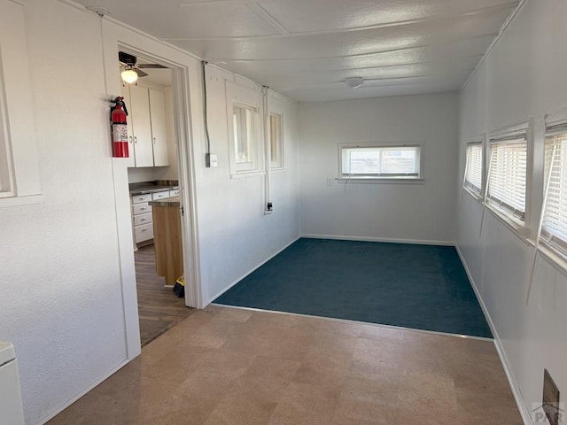 corridor featuring tile patterned floors