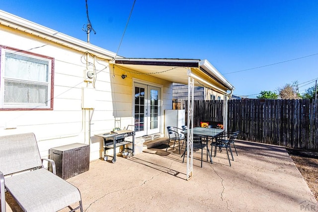 view of patio / terrace with fence and outdoor dining space