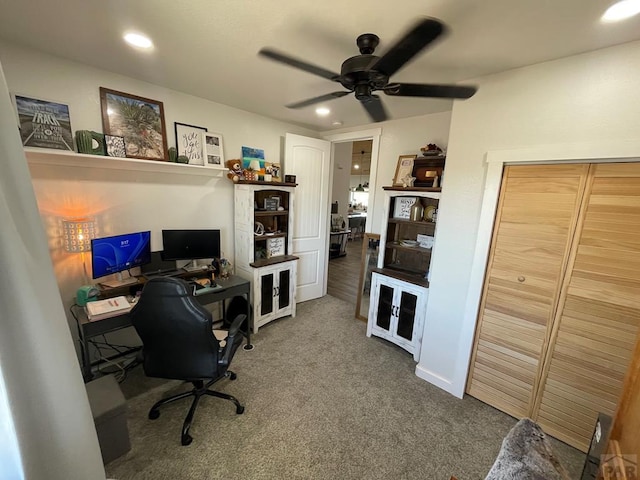 carpeted office with a ceiling fan and recessed lighting