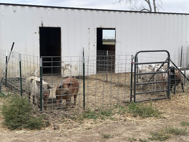 view of outbuilding featuring an outbuilding and an exterior structure