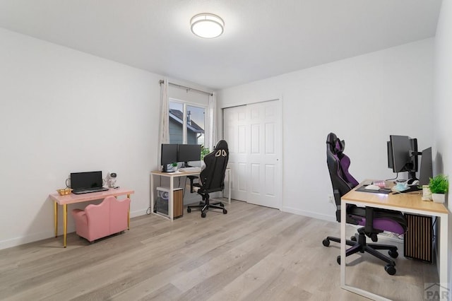 2200 Meadowlark Ln, Pueblo, CO 81008 - office with baseboards and wood finished floors
