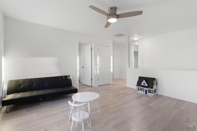 2200 Meadowlark Ln, Pueblo, CO 81008 - living area featuring ceiling fan, wood finished floors, and visible vents