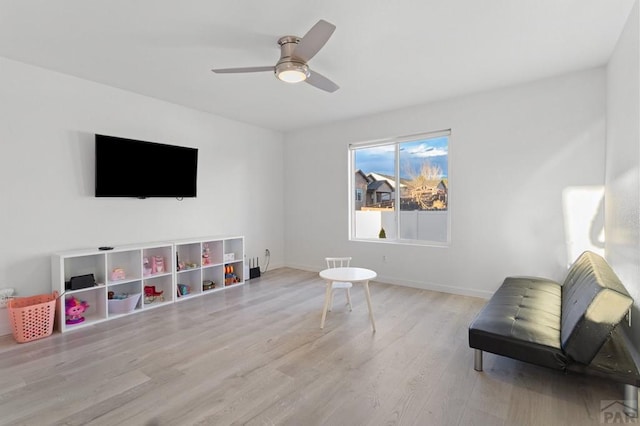2200 Meadowlark Ln, Pueblo, CO 81008 - sitting room featuring baseboards, a ceiling fan, and wood finished floors